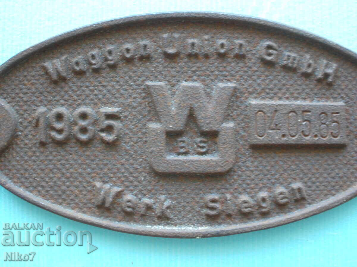 Δημοπρασία Παλιά (1985), μεταλλική πινακίδα από βαγόνι τρένου