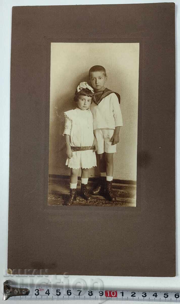 .OLD CHILDHOOD PHOTOGRAPH CARDBOARD PORTRAIT .OLD CHILDHOOD PHOTOGRAPH CARDBOARD PORTRAIT