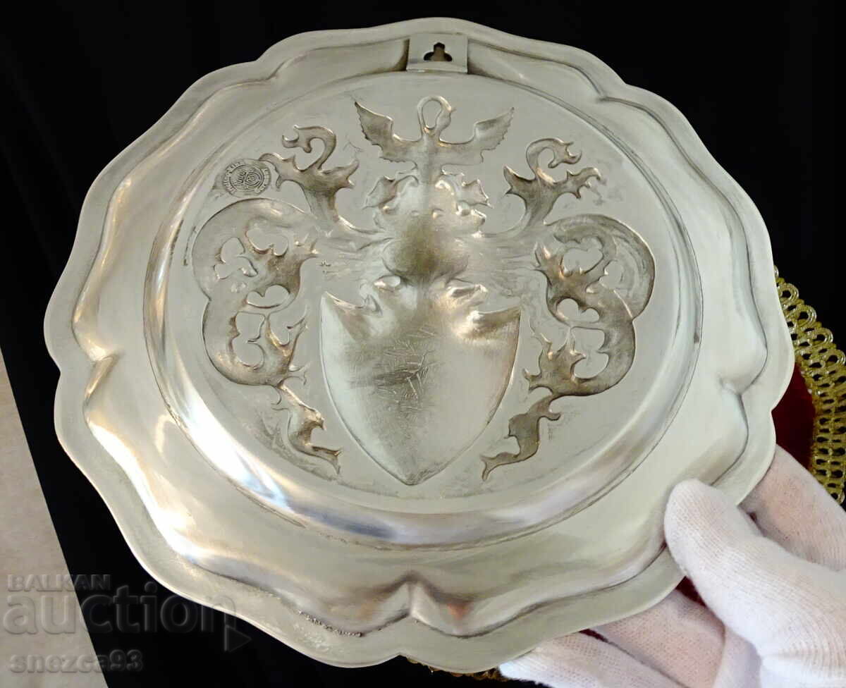Delivery of Pewter plate, pewter panel with family symbols, pewter