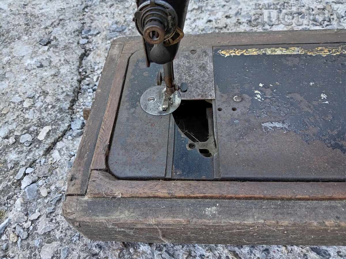 Auction  Antique Singer Sewing Machine