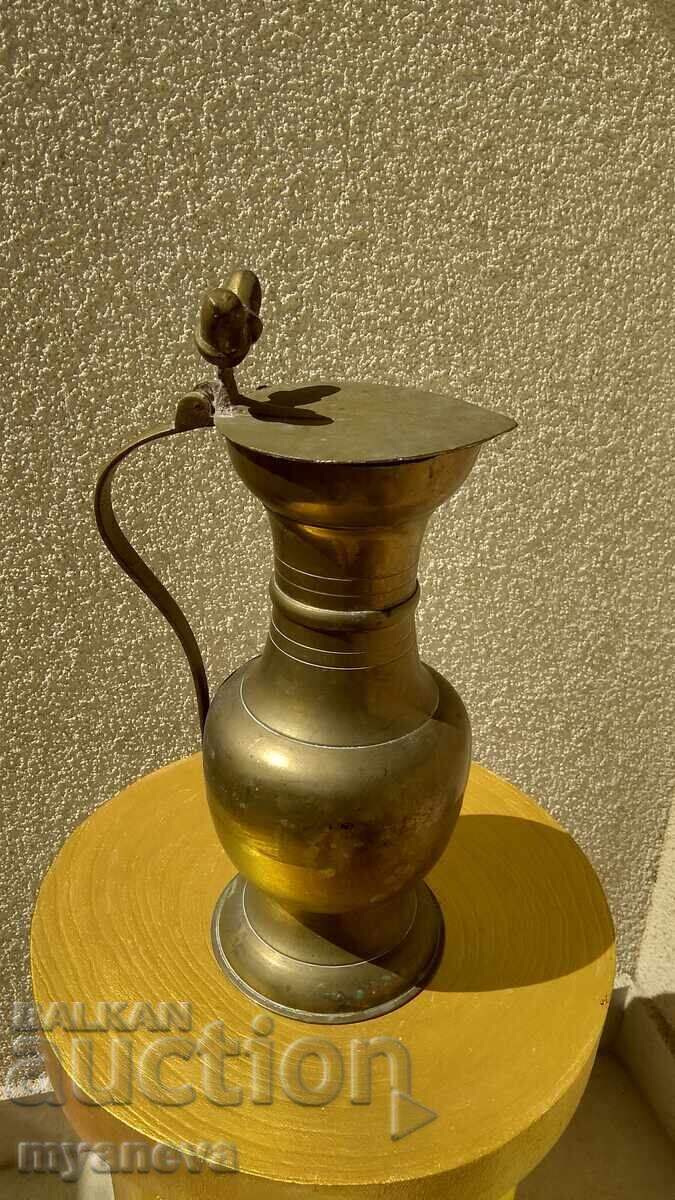 Large, metal jug with a lid, decorated with hazelnuts with price 50.00 BGN | € 25.56