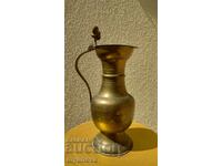 Large, metal jug with a lid, decorated with hazelnuts