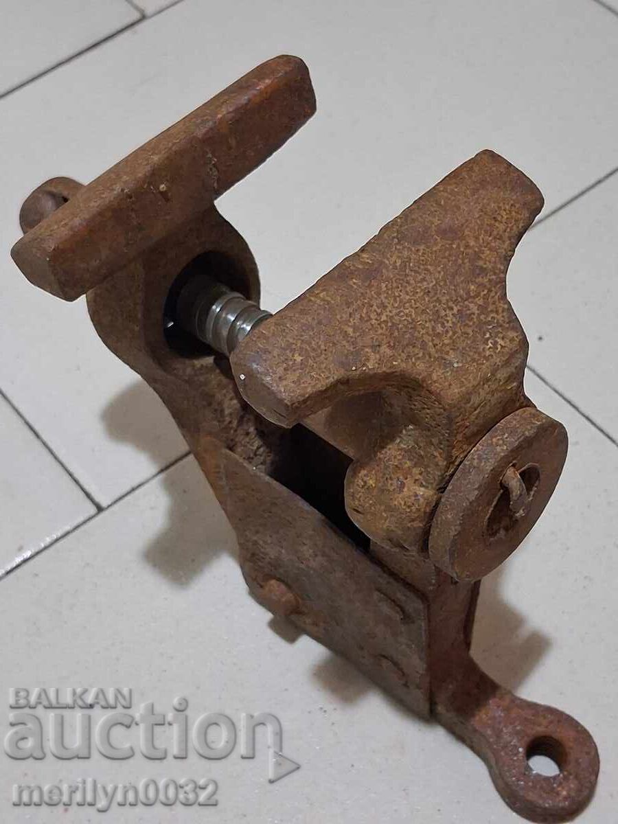 Delivery of An old vise clamps a blacksmith's tool