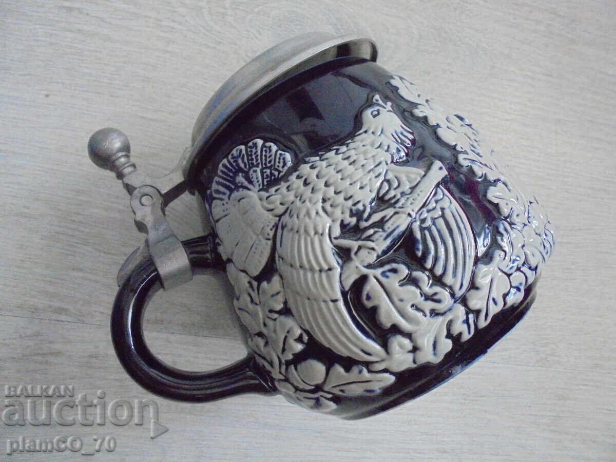 Auction №8208 Relief Porcelain Mug with Metal Lid Rein Zinn Auction №8208 Relief Porcelain Mug with Metal Lid Rein Zinn