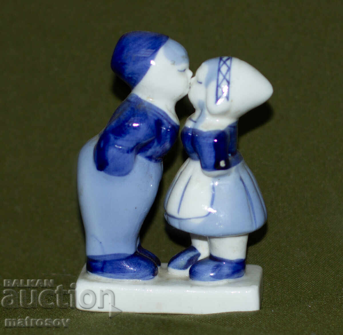 Auction Old porcelain figurine of a boy and a girl Auction Old porcelain figurine of a boy and a girl