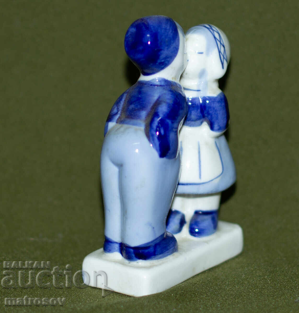 Delivery of Old porcelain figurine of a boy and a girl Delivery of Old porcelain figurine of a boy and a girl