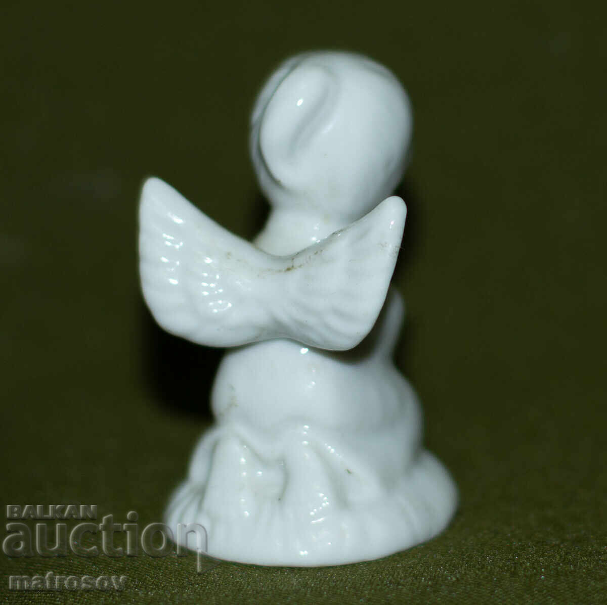 Auction  Handmade decorative porcelain figurine of an angel