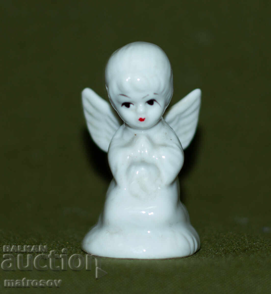 Handmade decorative porcelain figurine of an angel