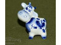 Παλιό πορσελάνινο ειδώλιο αγελάδας