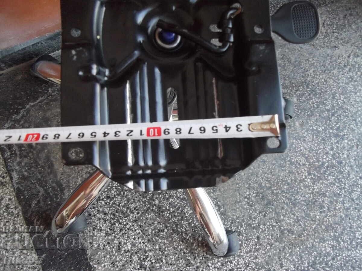 Swivel base with wheels, shock absorber, and mechanism for an office chair -7 - 5 Swivel base with wheels, shock absorber, and mechanism for an office chair -7 - 5