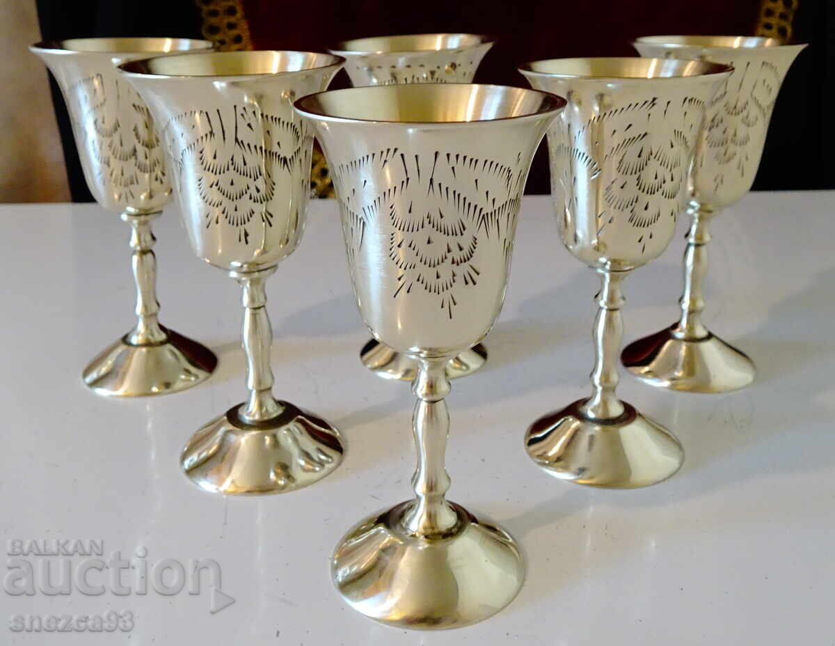 Exquisite bronze brandy cups, embossed