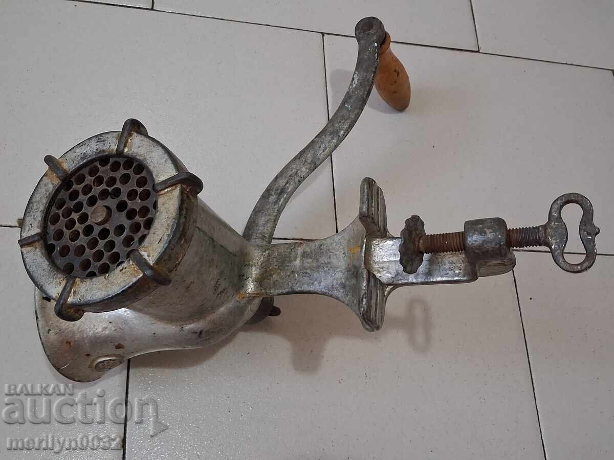 Delivery of Old meat grinder, grinder