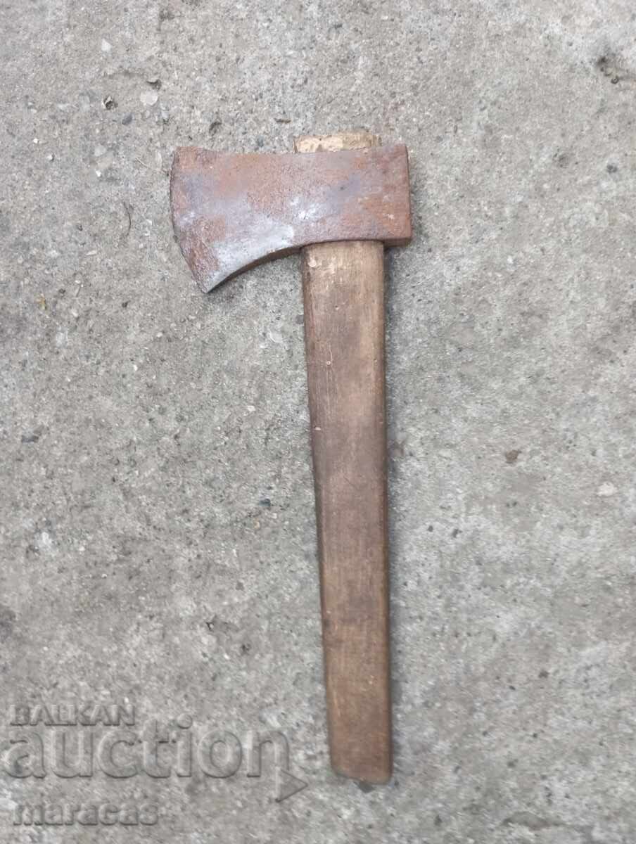 An old small axe with price 11.25 €