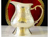 Shiny bronze jug, pitcher, baroque