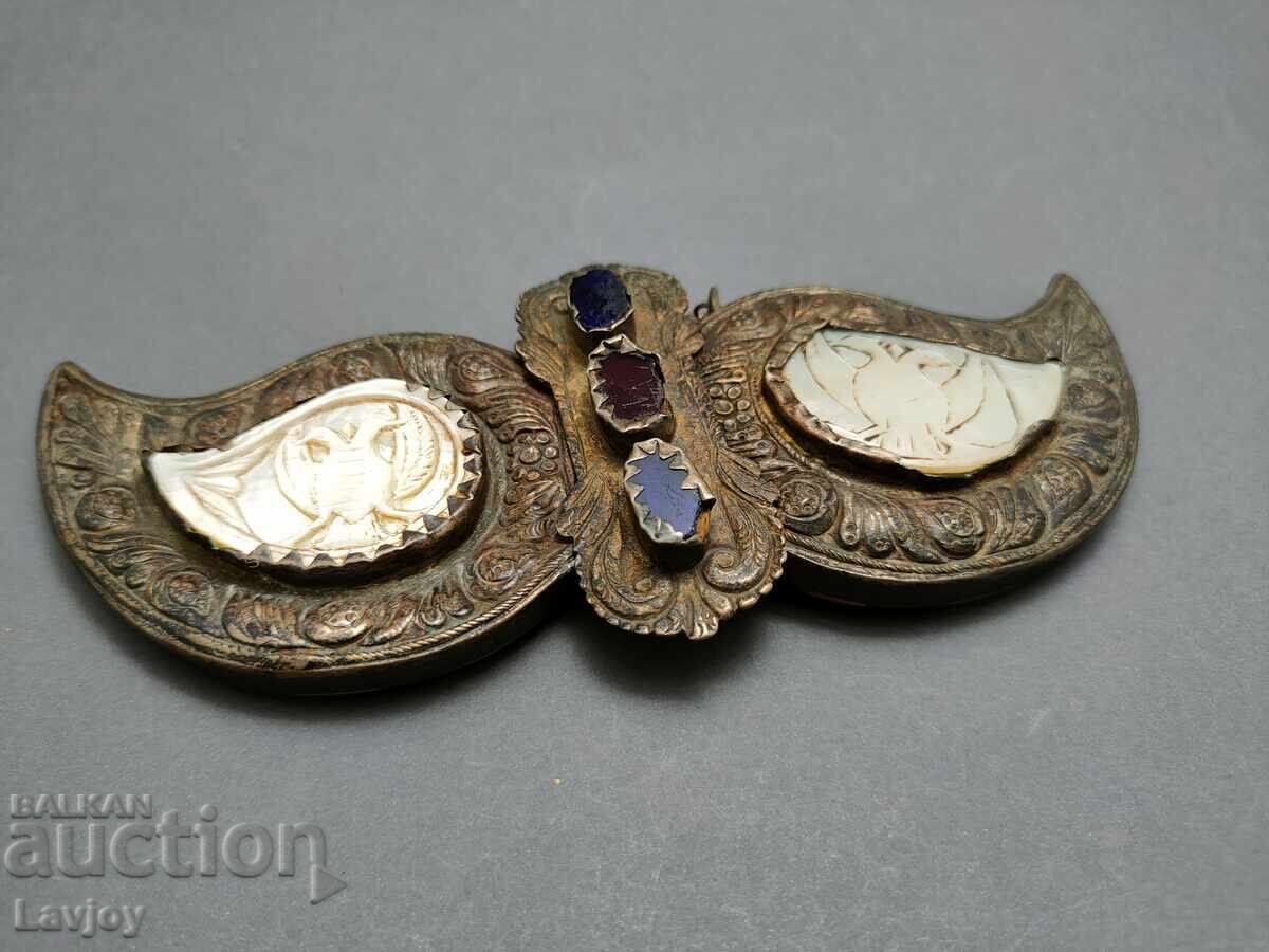 Delivery of Revival-era silver buckle with mother-of-pearl ###