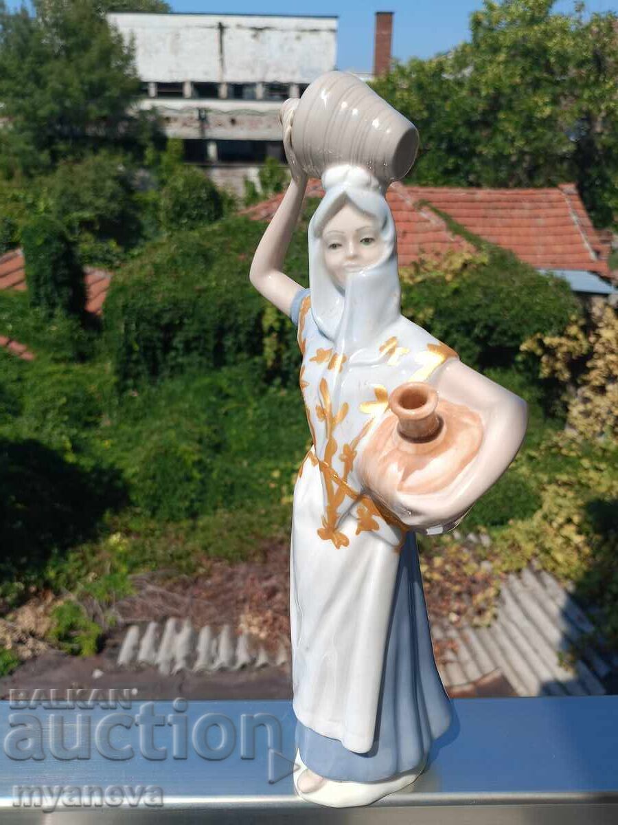 Porcelain figure, woman with a jug with price 30.00 BGN | € 15.34