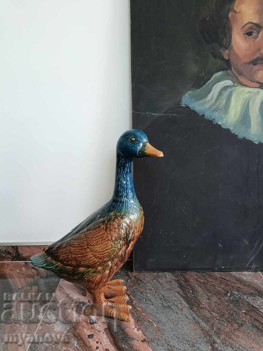 Auction  Porcelain figure of a duck, goose