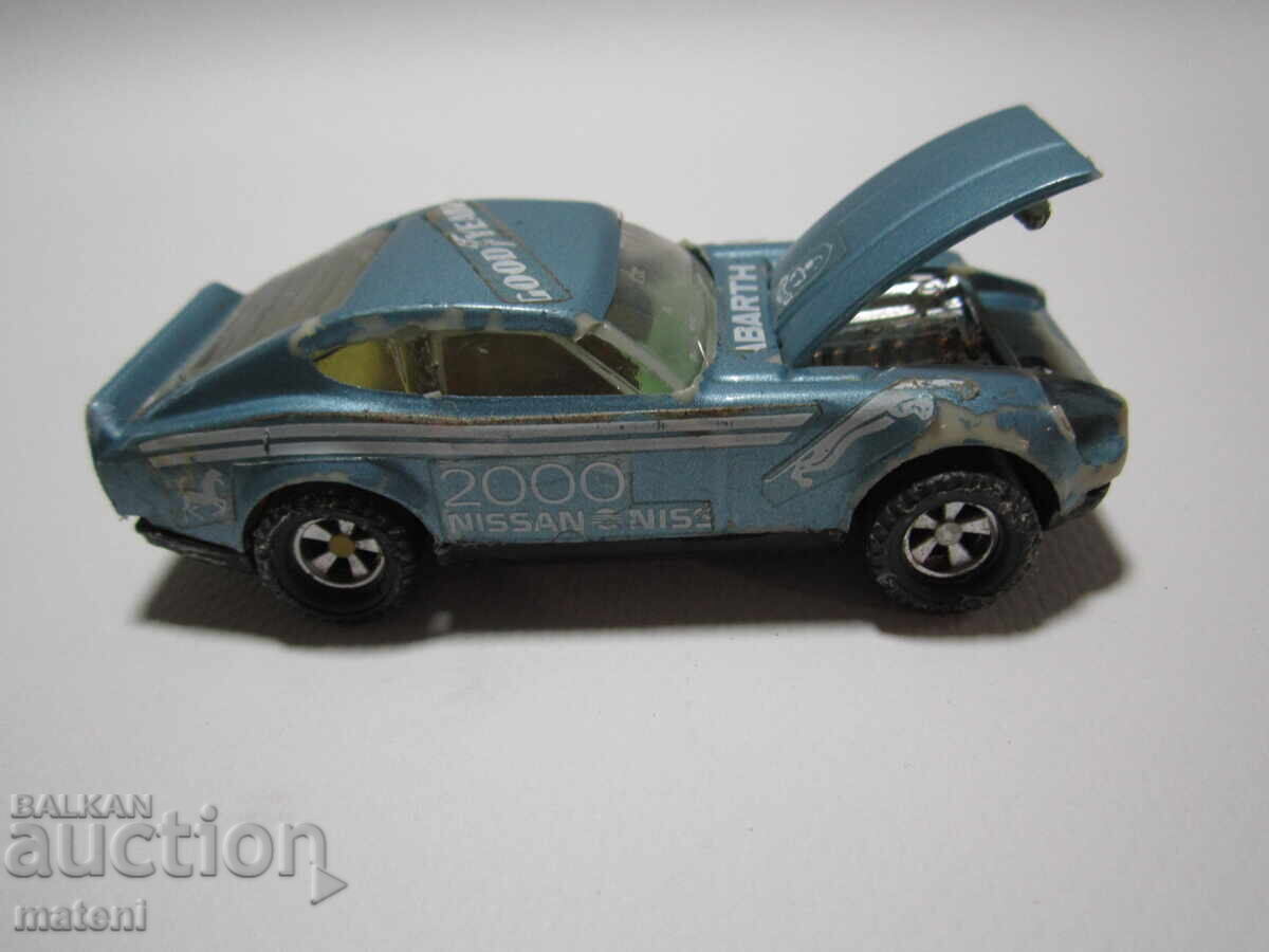 Auction CHILDREN'S TOY CAR AUTOMOBILE LONZA NISSAN Auction CHILDREN'S TOY CAR AUTOMOBILE LONZA NISSAN