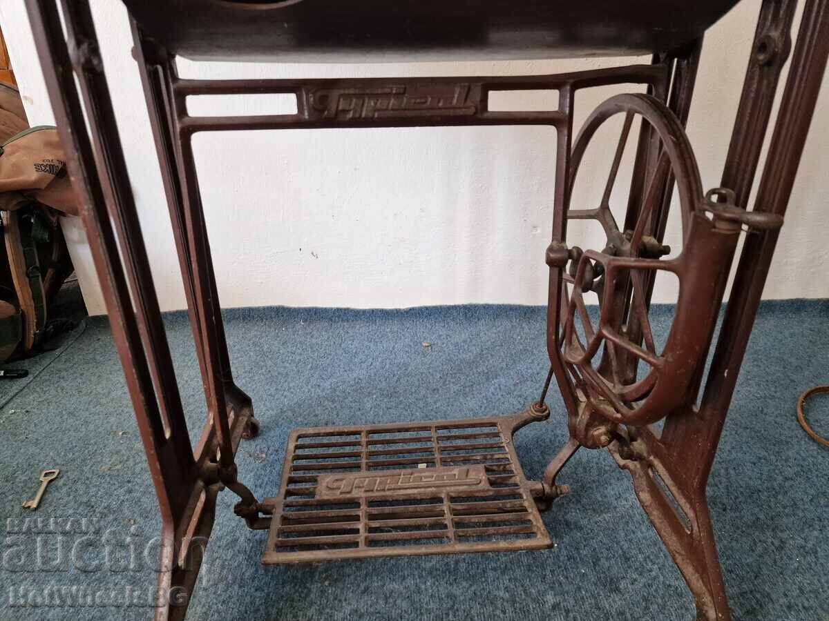 Auction  Typical Foot-Operated Sewing Machine