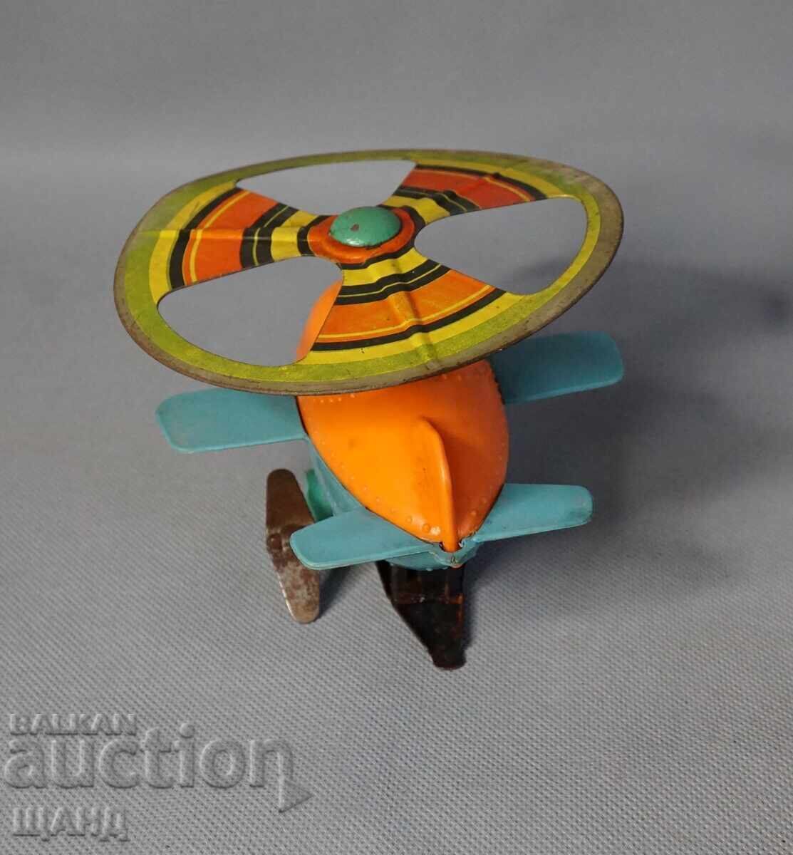 Delivery of Old Russian plastic mechanical toy helicopter model