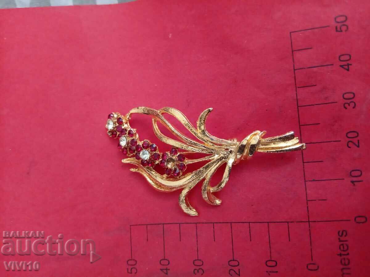 Broșă veche cu pietre, Aurire