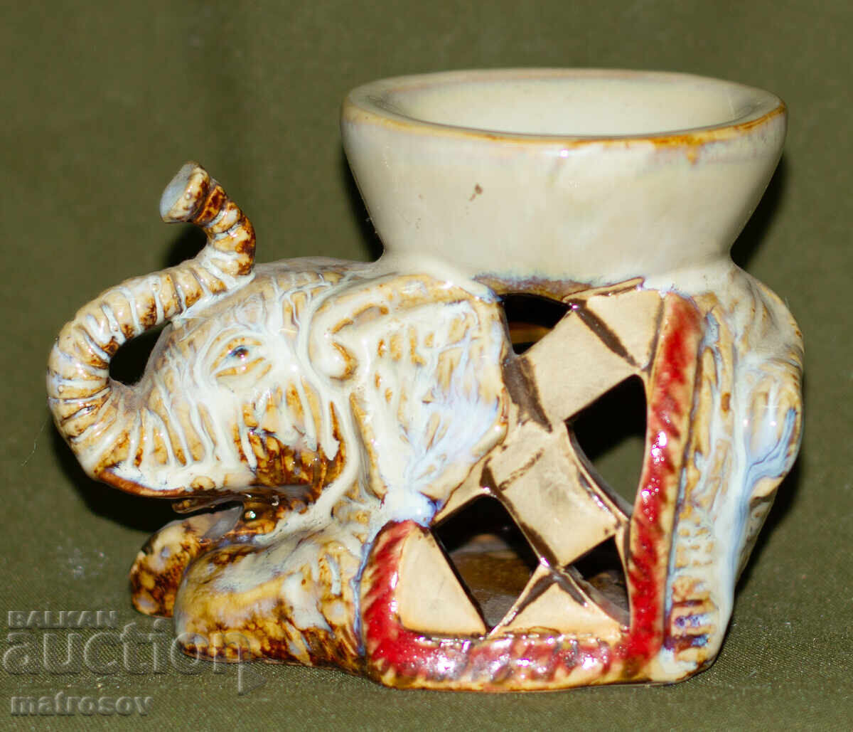 Decorative ceramic candle holder, elephant with price 100.00 BGN | € 51.13 Decorative ceramic candle holder, elephant with price 100.00 BGN | € 51.13