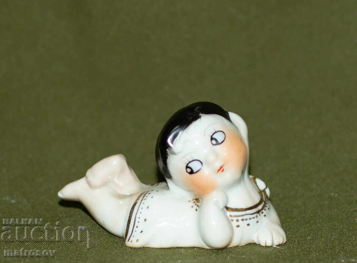 Old decorative porcelain figurine of a little girl with price 50.00 BGN | € 25.56