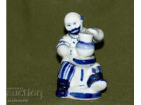 Veche statuetă decorativă din porțelan a unui olar