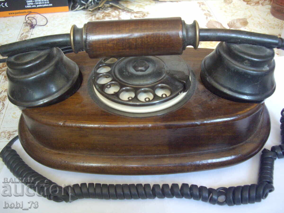 Old wooden interesting phone with price 120.00 BGN | € 61.36 Old wooden interesting phone with price 120.00 BGN | € 61.36