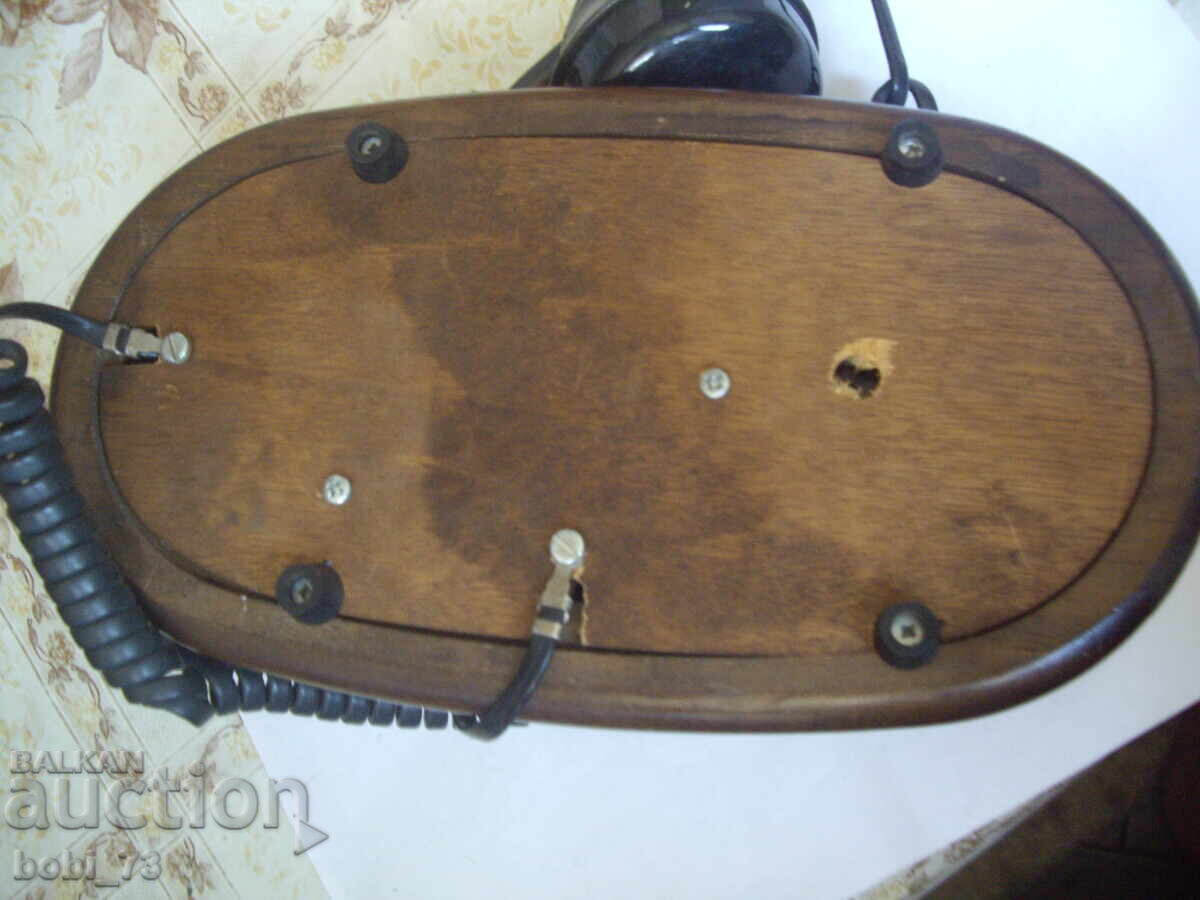 Delivery of Old wooden interesting phone Delivery of Old wooden interesting phone