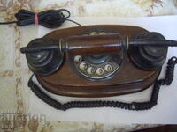 Old wooden interesting phone