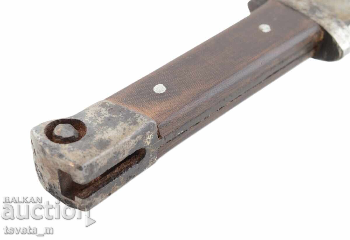 Delivery of Mannlicher knife with sheath