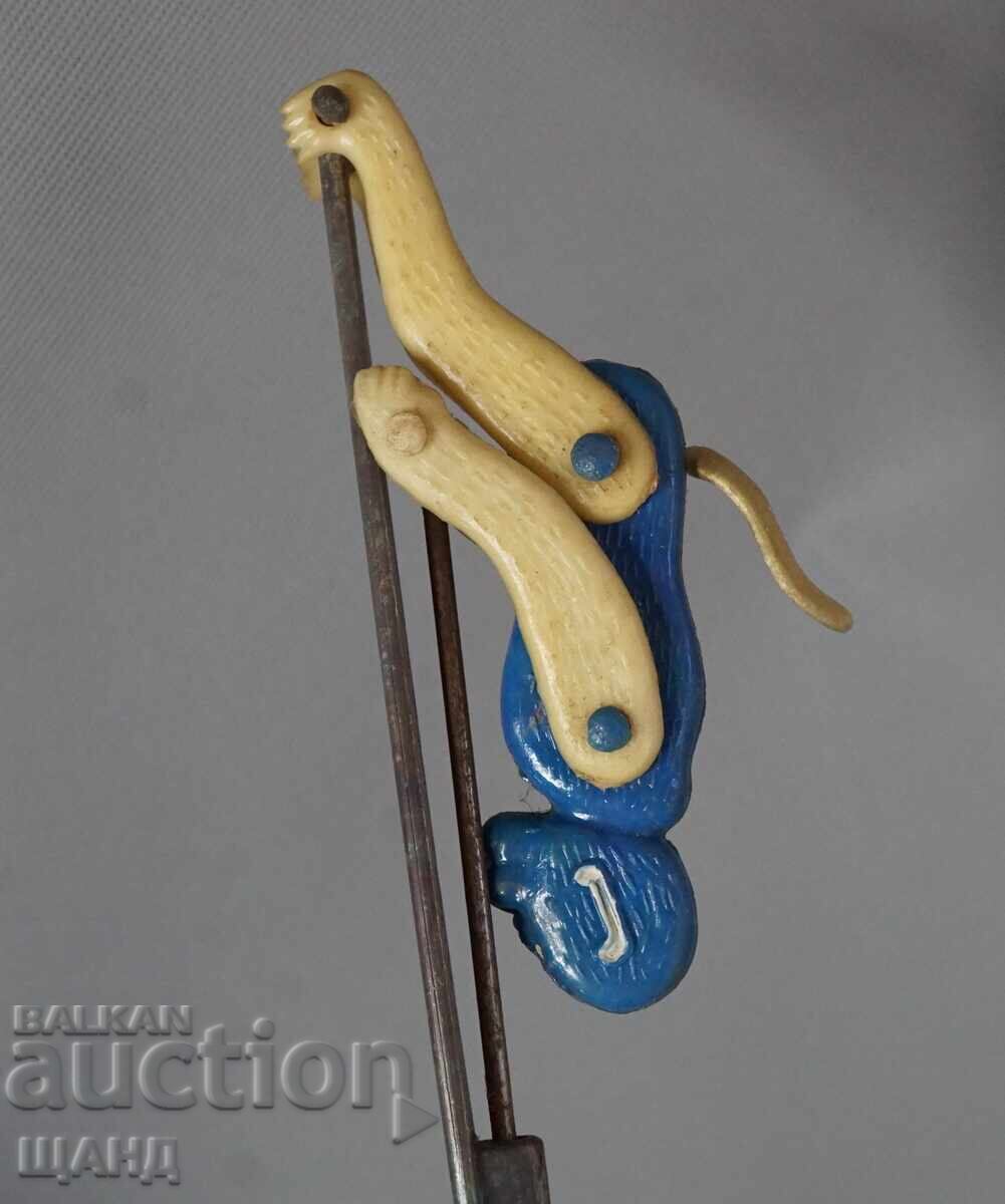 Delivery of Old Plastic Toy Figure Climbing Monkey