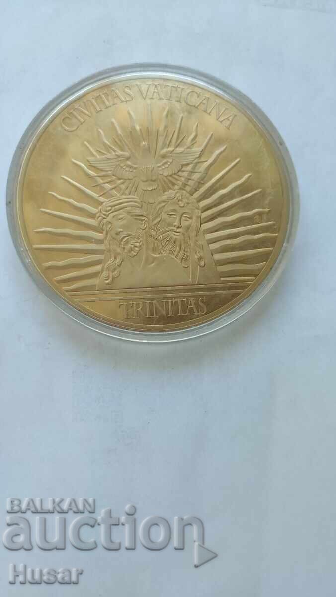 Delivery of Vatican gold-plated plaque God, Father, Holy Spirit