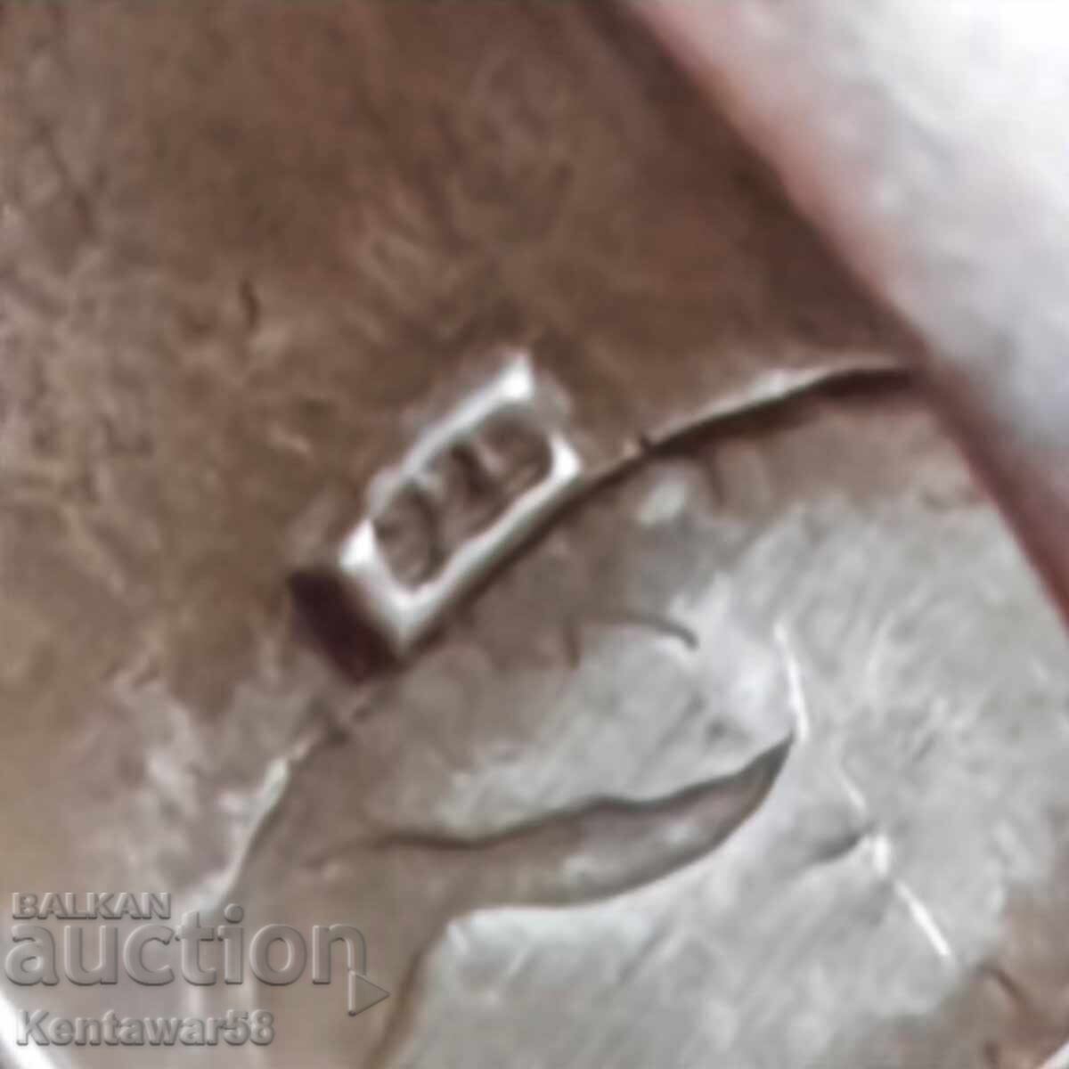 An old silver ring. - 5 An old silver ring. - 5