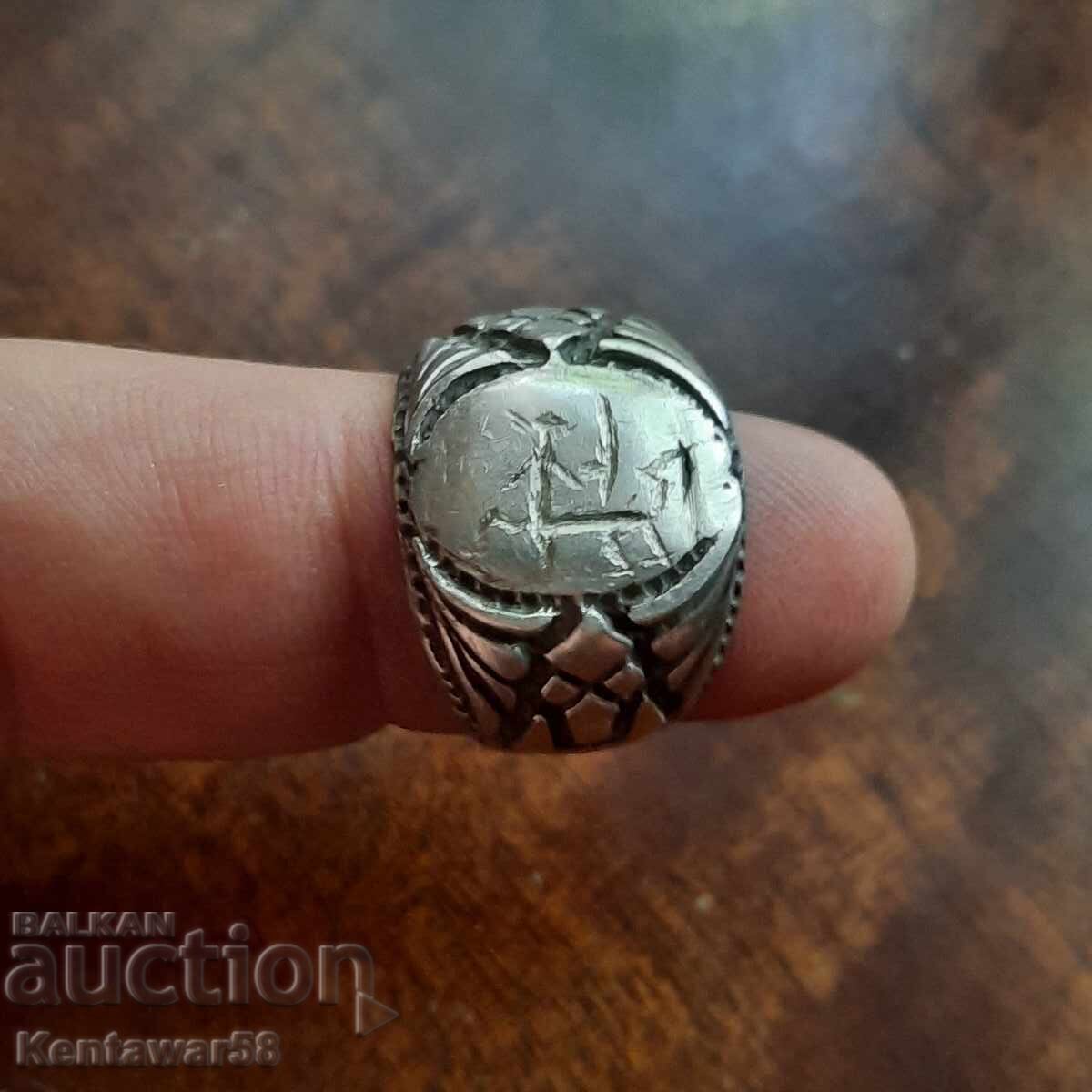 An old silver ring. An old silver ring.