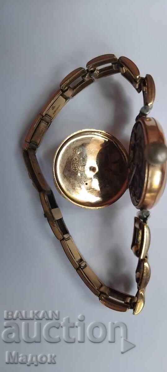 Livrarea Un ceas de aur Livrarea Un ceas de aur