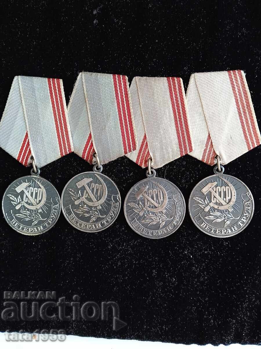 4 Medals Veteran of Labour USSR with different stamps on the coins