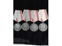 4 Medals Veteran of Labour USSR with different stamps on the coins