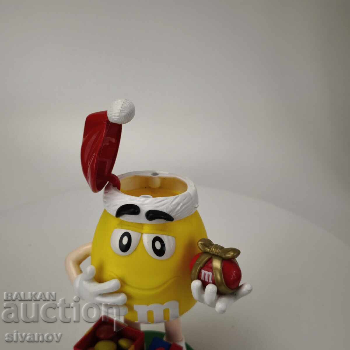 Livrarea Dozator de bomboane M&M's galben, ediție de Crăciun #6176 Livrarea Dozator de bomboane M&M's galben, ediție de Crăciun #6176