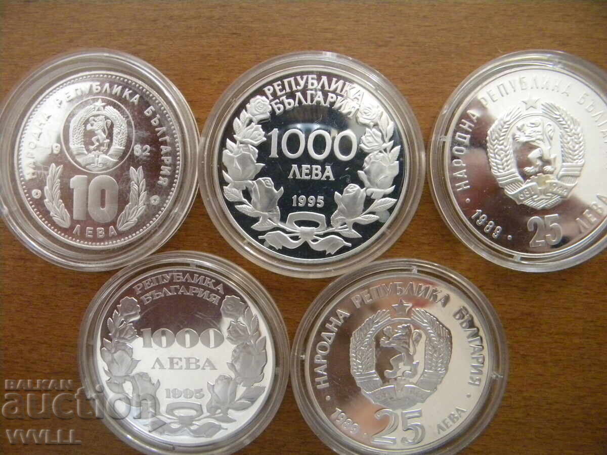Licitație Lot de 5 monede de argint. 1982, 1989, 1995 Licitație Lot de 5 monede de argint. 1982, 1989, 1995