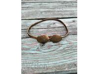 Centură aurită veche în formă de scoică