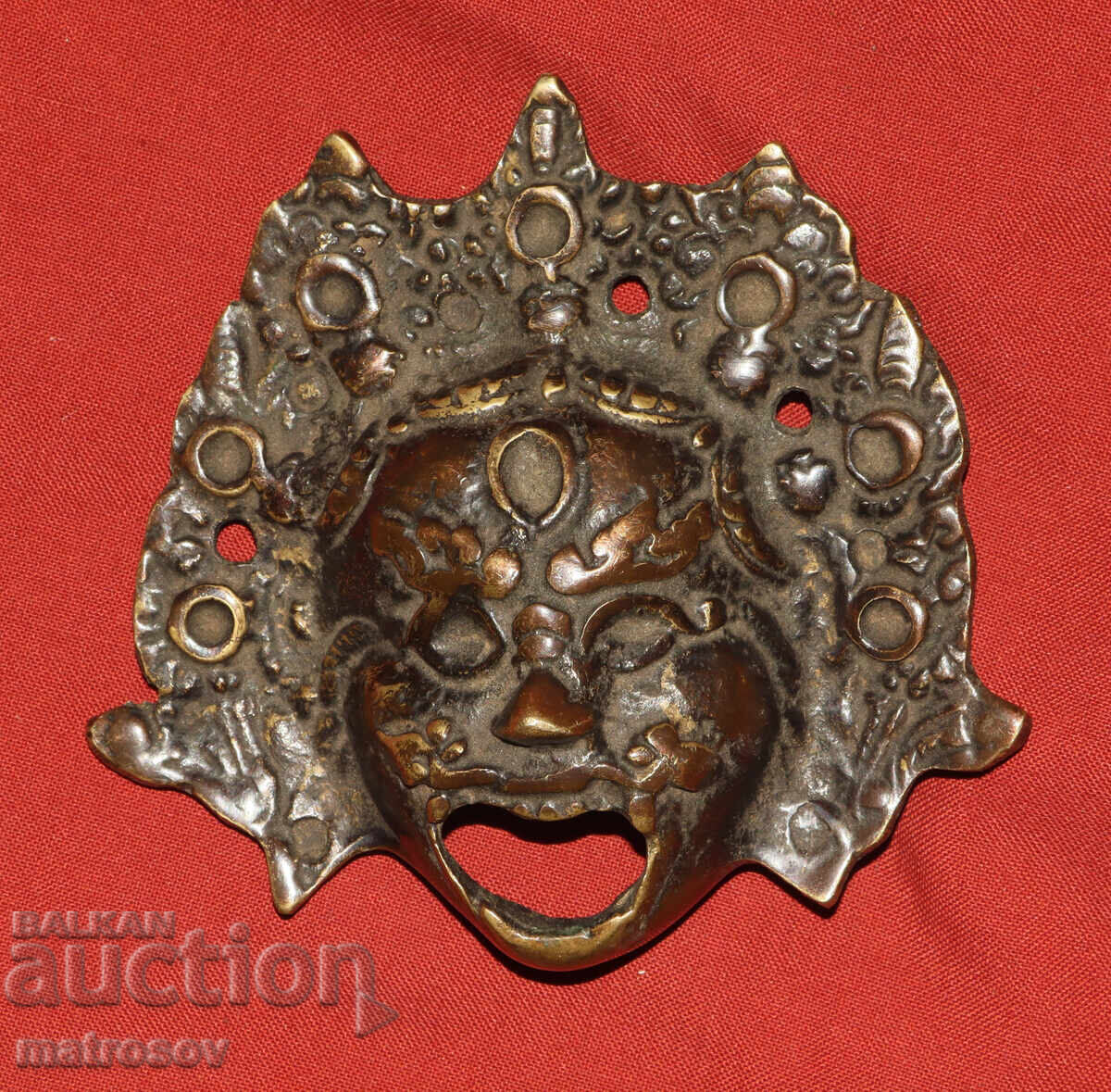 Χάλκινο ανάγλυφο γλυπτό, μάσκα