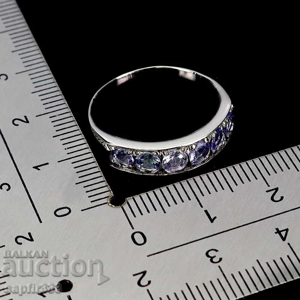 Auction  LUXURY RING WITH NATURAL TANZANITES