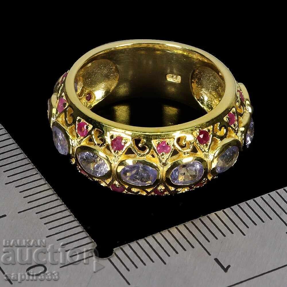 Auction  LUXURY RING WITH NATURAL TANZANITES AND RUBIES