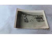 Fotografie Un tânăr și o fată pe plajă