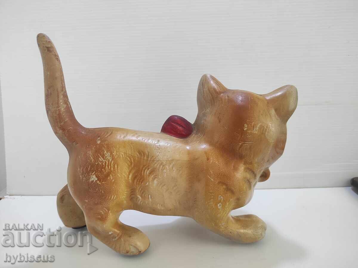 Auction  Old toy cat on wheels