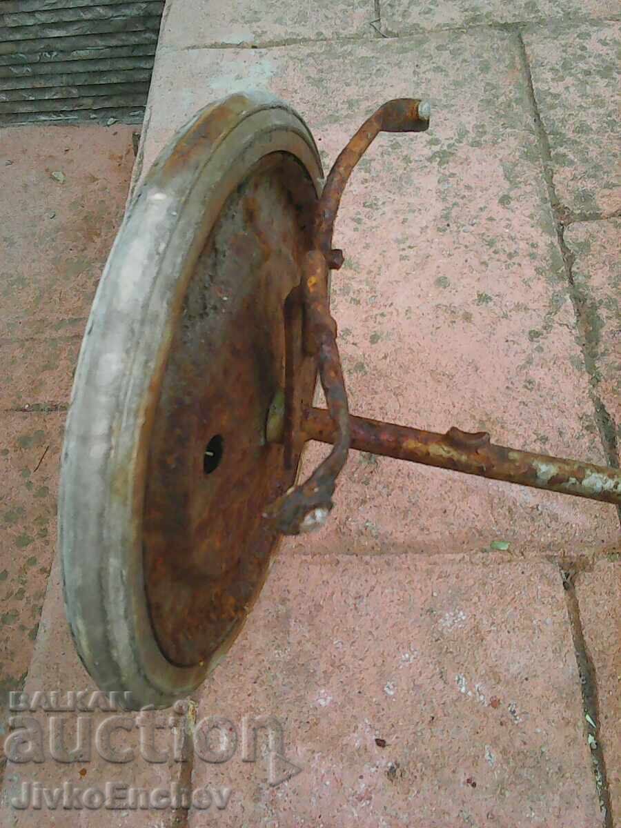 Auction Old wheels from a baby stroller Auction Old wheels from a baby stroller