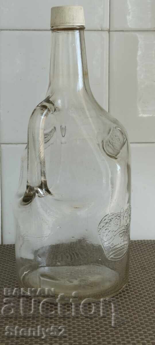 Old glass demijohn from Smirnoff vodka - thick glass with price 5.00 BGN | € 2.56