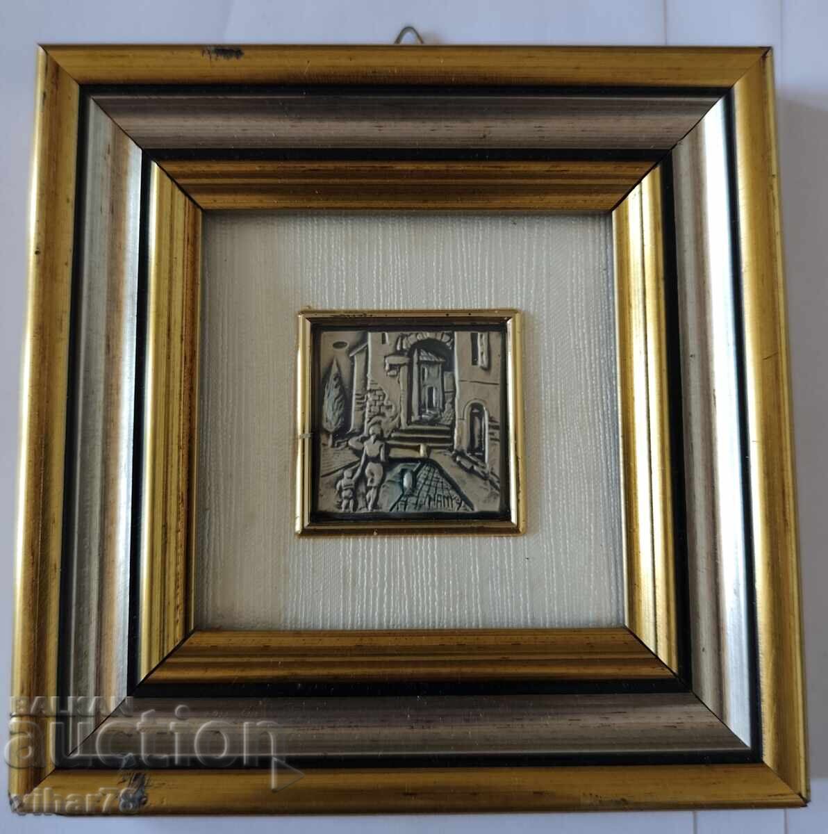 Small picture with a silver plaque